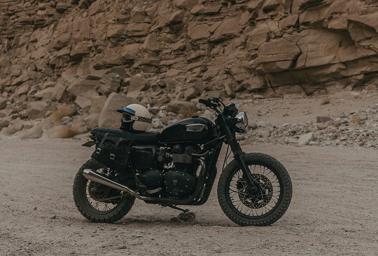 Vintage saddlebags on custom Bonneville.