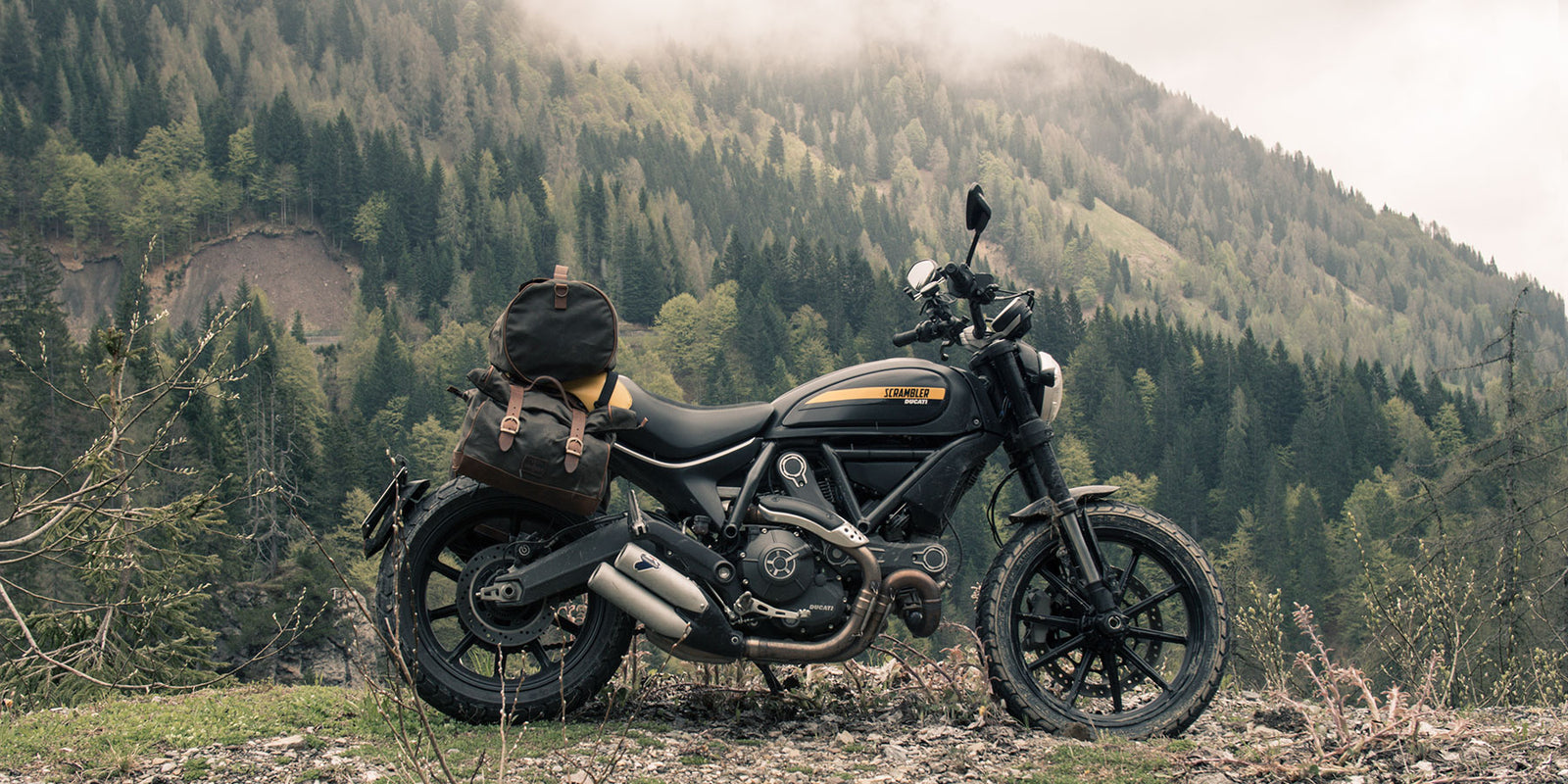 Luggage on Ducati Scrambler in the mountains.