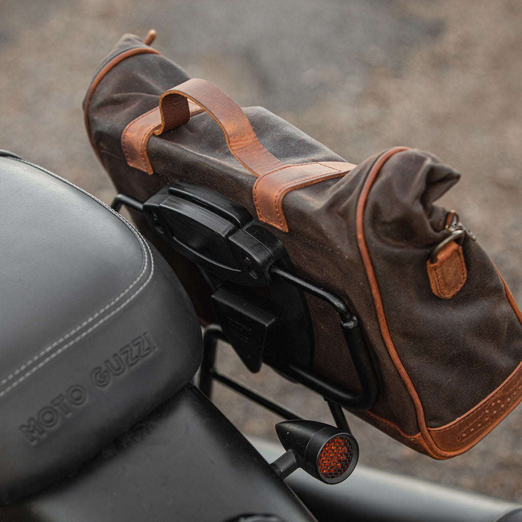 Saddlebag mount bracket for Guzzi V7.